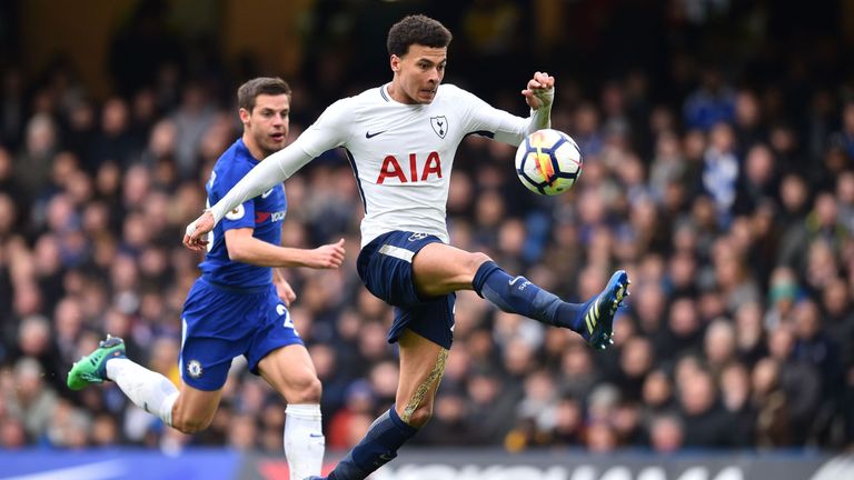 Tottenham Hotspur's English midfielder Dele Alli controls the ball in the build up to scoring their second goal during the English Premier League football match between Chelsea and Tottenham Hotspur at Stamford Bridge in London on April 1, 2018. Tottenham won the game 3-1.