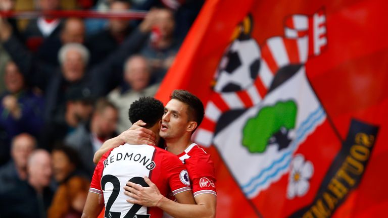 Dusan Tadic celebrates with teammate Nathan Redmond after opening the scoring at St Mary's