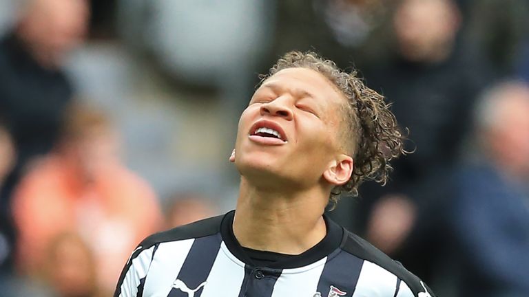 Dwight Gayle reacts after missing a chance during the Premier League match between Newcastle United and West Bromwich Albion at St James' Park