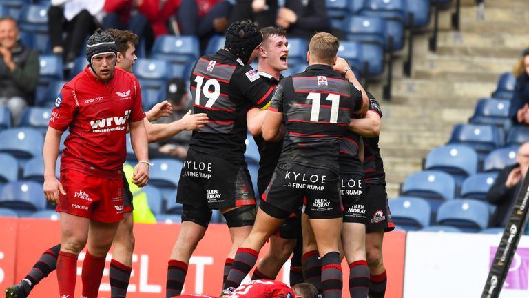 Edinburgh celebrate a Nathan Fowles try against Scarlets