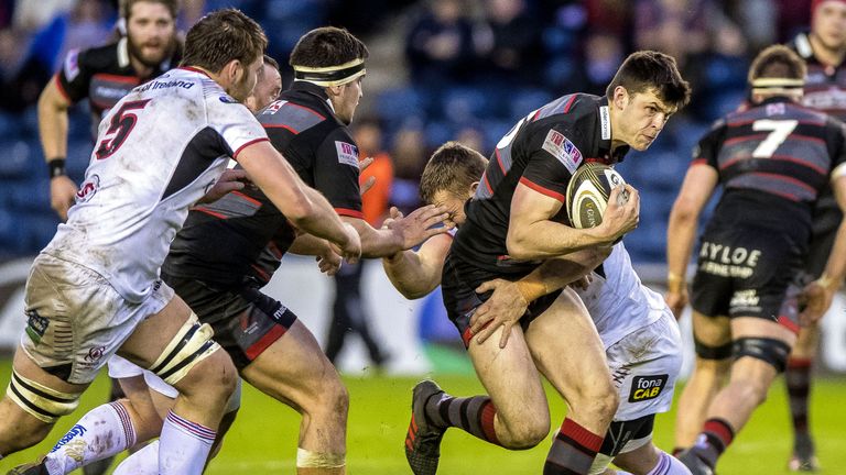 Edinburgh's Blair Kinghorn tackled Jean Deysel of Ulster