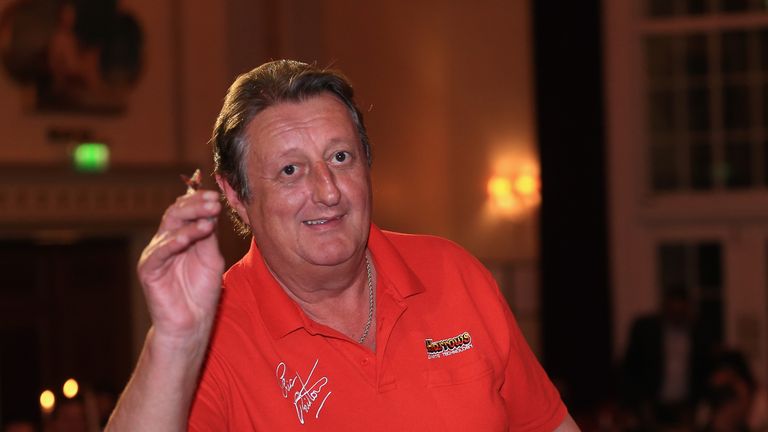 Eric Bristow, five-time world darts champion, is pictured during the Pound 4 Pound Charity fundraiser for Fight4change on May 7, 2014 in London, England. 