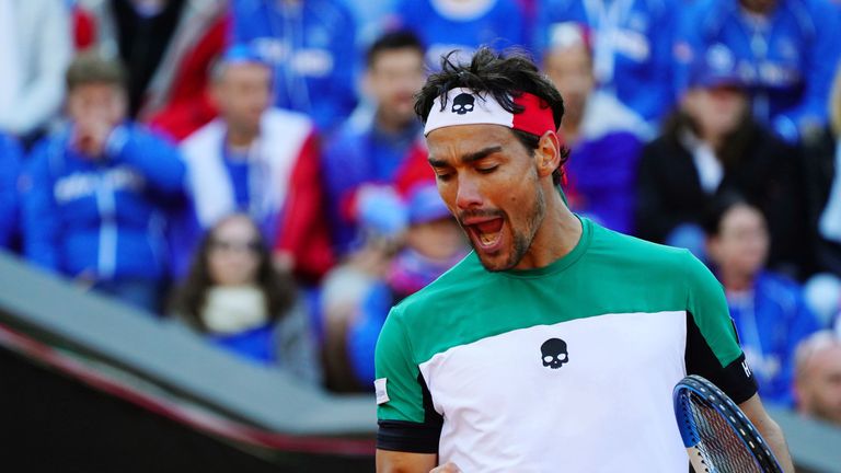 Italys Fabio Fognini reacts after winning a point in his match with France's Jeremy Chardy during the Davis Cup quarter final Italy versus France on April 6, 2018 at the 'Valletta Cambiaso' in Genoa