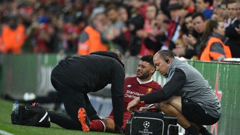 Alex Oxlade-Chamberlain suffers an injury against Roma