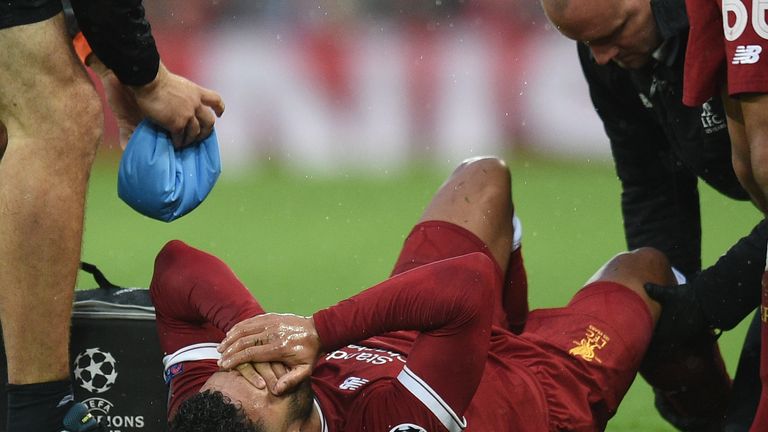 Alex Oxlade-Chamberlain suffers an injury against Roma