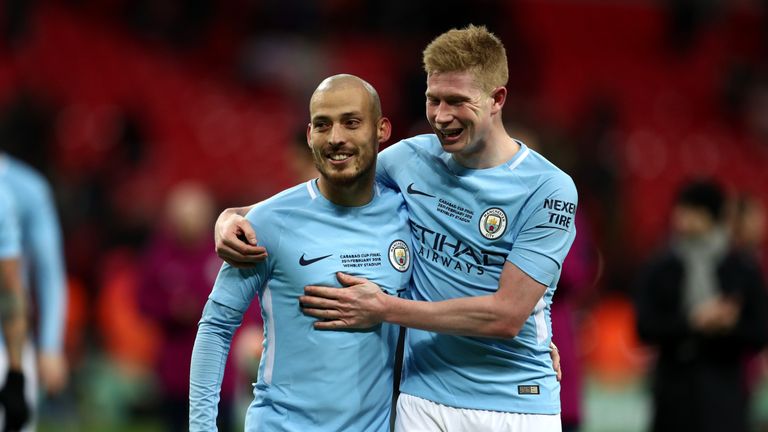 David Silva and Kevin De Bruyne celebrate Manchester City's Carabao Cup final win over Arsenal