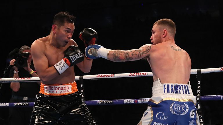 Carl Frampton (right) and Nonito Donaire in action during the WBO Interim World Featherweight Championship Bout at the SSE Arena, Belfast.