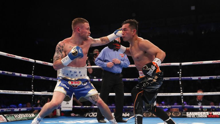 Carl Frampton (left) and Nonito Donaire in action during the WBO Interim World Featherweight Championship Bout at the SSE Arena, Belfast.