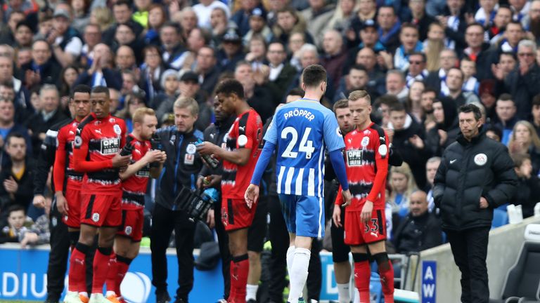 Davy Propper trudges off after being shown a red card