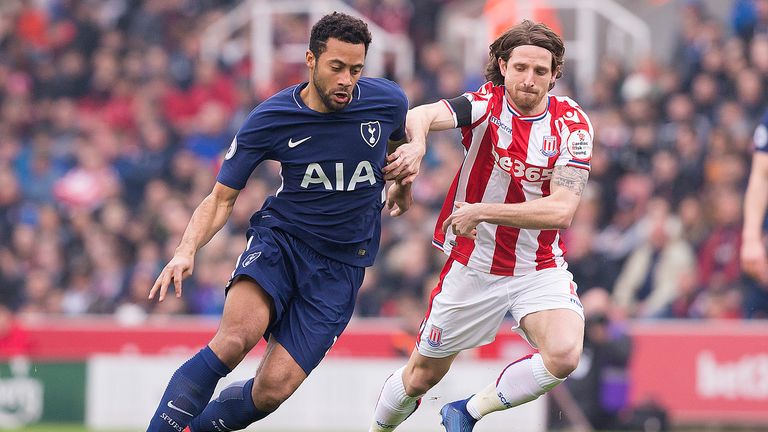Mousa Dembele and Joe Allen in action during the Premier League match between Stoke City and Tottenham Hotspur at the Bet365 Stadium