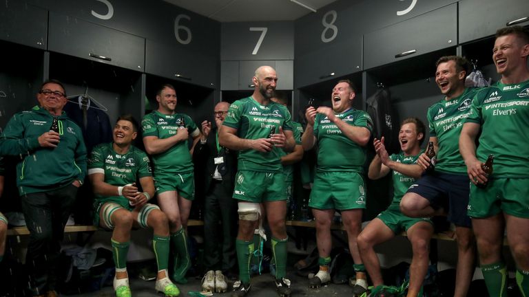 Connacht's John Muldoon celebrates with teammates in the dressing room after his final game.