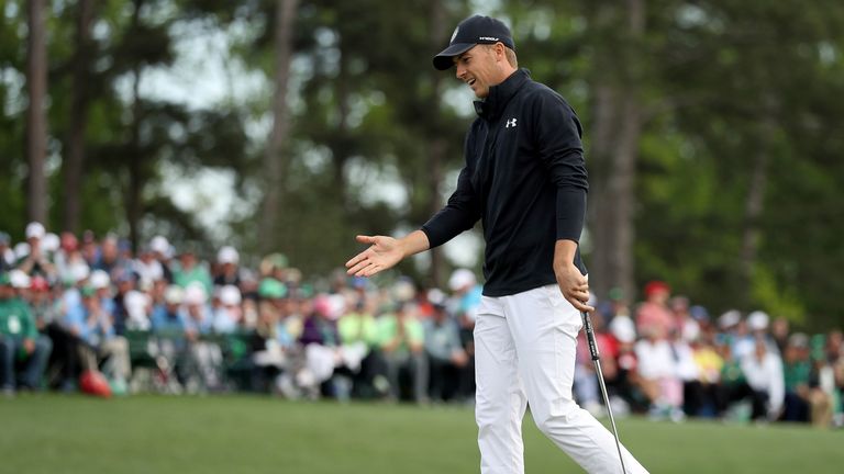 Jordan Spieth of the United States urges on his putt on the 18th green during the final round of the 2018 Masters Tournament at Augusta National Golf Club