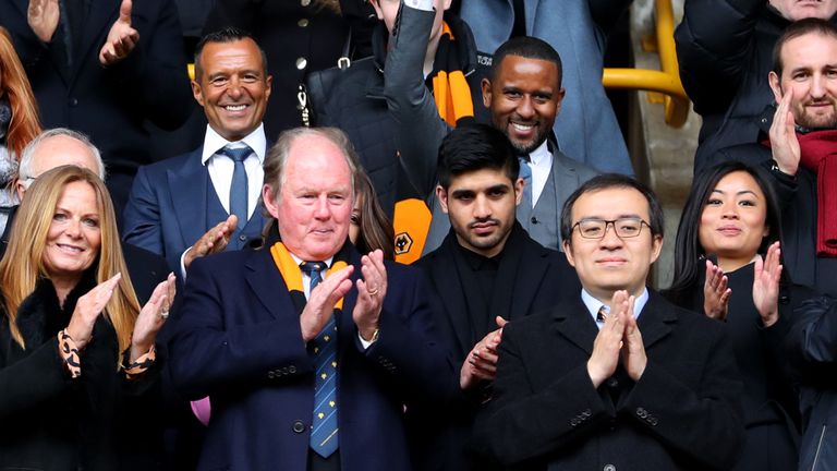 Football agent Jorge Mendes, Steve Morgan, and Jeff Shi celebrate the 2-1 victory over Birmingham City and Wolverhampton Wanderers' promotion to the Premier League at Molineux on April 15, 2018