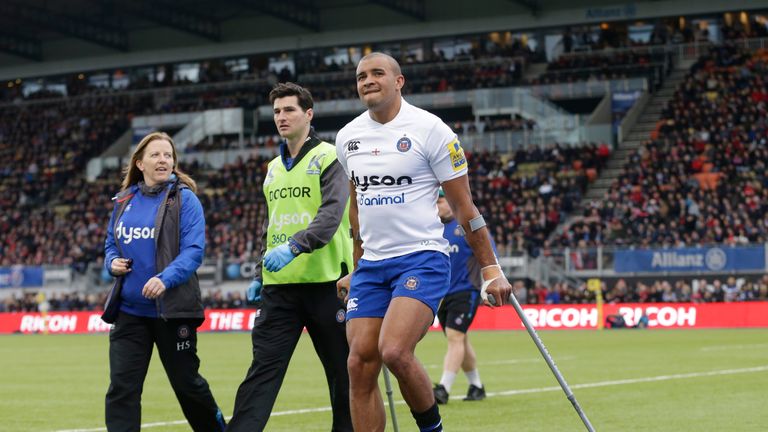 Jonathan Joseph walks off the field with crutches 