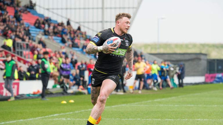 Warrington's Josh Charnley heads in for a try 