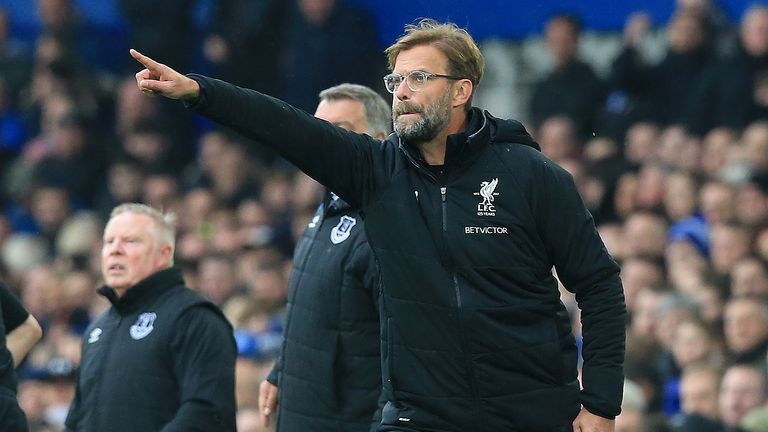 Jurgen Klopp gives his side instructions from the touchline at Goodison Park