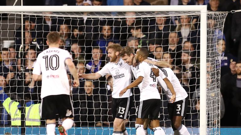 LONDON, ENGLAND - APRIL 03: Kevin McDonald of Fulham celebrates after scoring his sides first goal with his Fulham team mates during the Sky Bet Championship match between Fulham and Leeds United at Craven Cottage on April 3, 2018 in London, England