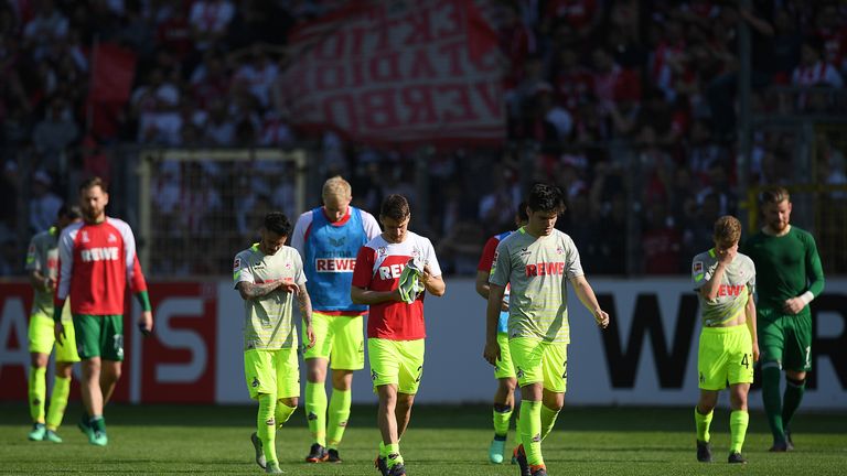 FREIBURG IM BREISGAU, GERMANY - APRIL 28: Players of Koeln look dejected after the Bundesliga match between Sport-Club Freiburg and 1. FC Koeln at Schwarzwald-Stadion on April 28, 2018 in Freiburg im Breisgau, Germany. (Photo by Matthias Hangst/Bongarts/Getty Images)