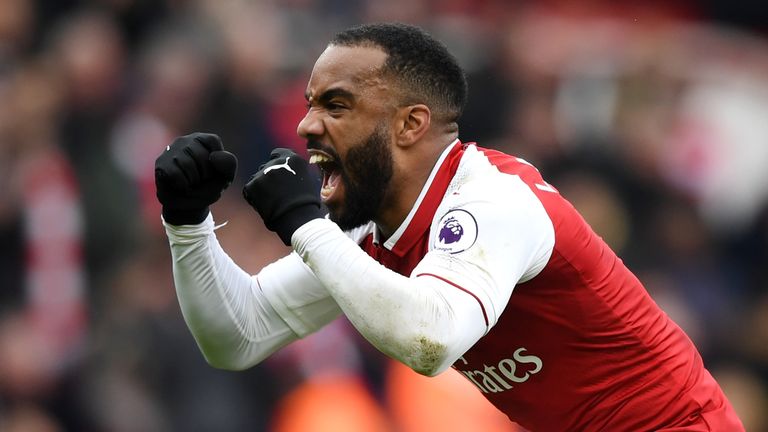 Alexandre Lacazette of Arsenal celebrates after scoring his side's third goal during the Premier League match between Arsenal and Stoke City at Emirates Stadium on April 1, 2018 in London, England.