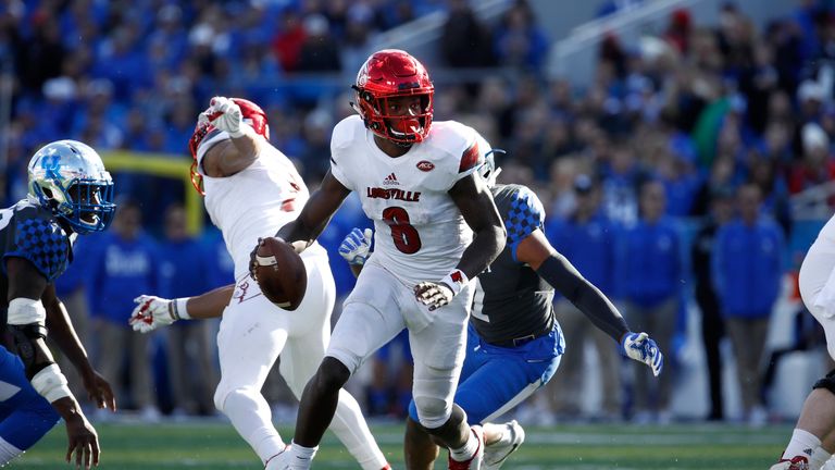 Lamar Jackson of the Louisville Cardinals against the Kentucky Wildcats during the game at Commonwealth Stadium on November 25, 2017 in Lexington, Kentucky.