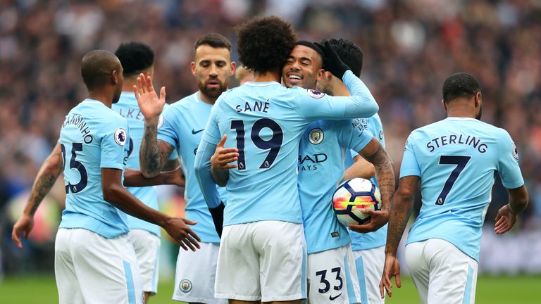 Leroy Sane celebrates with his team-mates after scoring Manchester City's first goal against West Ham 