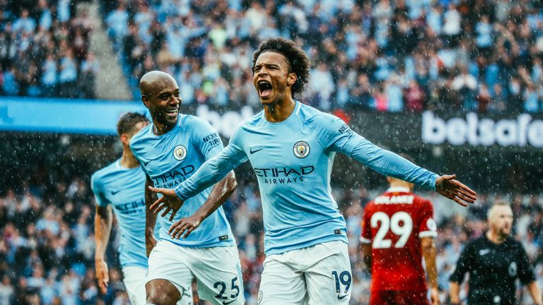 Leroy Sane celebrates scoring to make it 5-0 during the Premier League match between Manchester City and Liverpool at Etihad Stadium on September 9, 2017