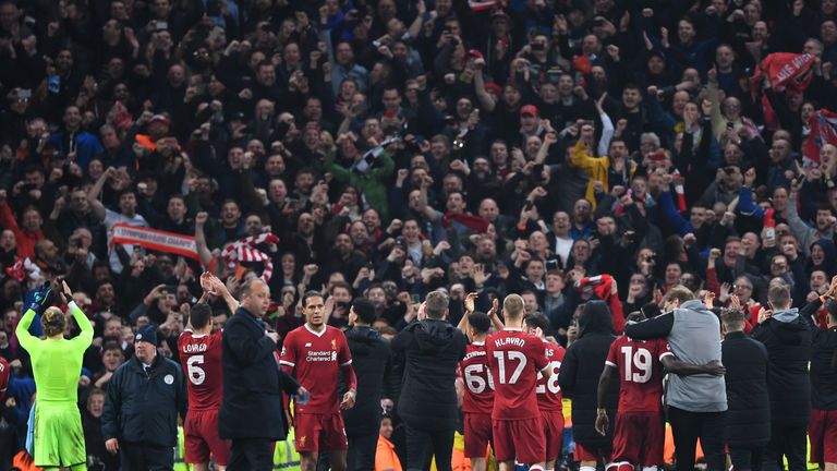 Liverpool celebrate with the fans after their Champions League win at Man City