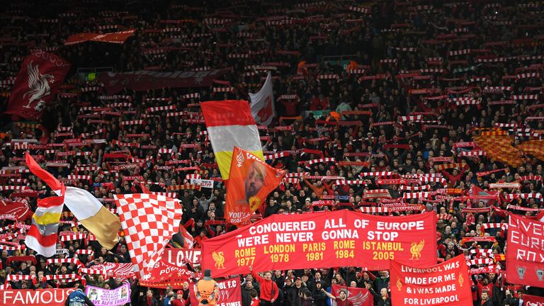 Liverpool fans unfurl banners and wave flags during the UEFA Champions League quarter-final, first leg between Liverpool and Manchester City at Anfield on April 4, 2018