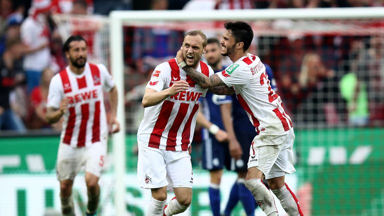 Marcel Risse celebrates his late goal for Cologne against Schalke