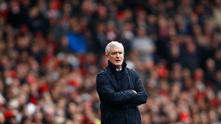 Mark Hughes looks on from the touchline during the Premier League match between Arsenal and Southampton at Emirates Stadium on April 8, 2018