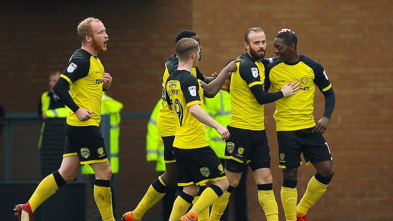 Burton Albion's Marvin Sordell (right) celebrates scoring his side's first goal of the game during the Championship match at the Pirelli Stadium on April 2, 2018