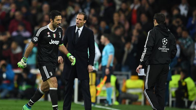 Gianluigi Buffon and Max Allegri during the UEFA Champions League Quarter Final Second Leg match between Real Madrid and Juventus at Estadio Santiago Bernabeu on April 11, 2018 in Madrid, Spain.