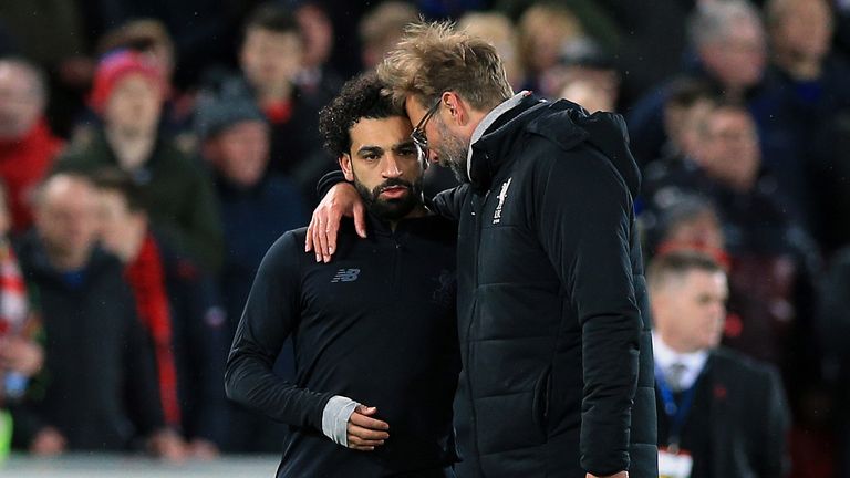 Jurgen Klopp catches a moment with Mohamed Salah after Liverpool&#39;s 3-0 defeat of Manchester City