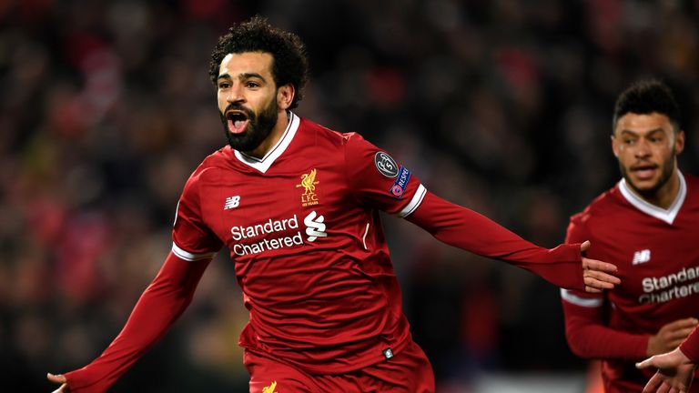 Mohamed Salah celebrates scoring Liverpool's first goal during the UEFA Champions League quarter final, first leg against Manchester City at Anfield
