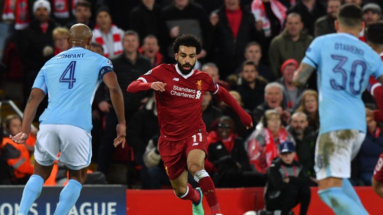 Mohamed Salah runs at the Manchester City defence during the UEFA Champions League quarter-final, first leg at Anfield