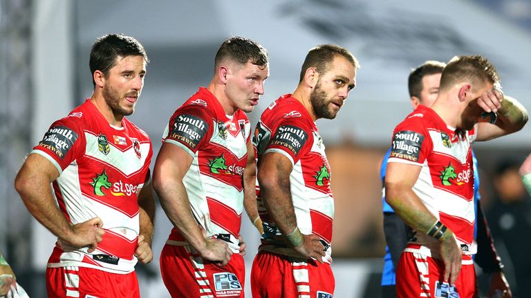 Dejected Dragons players  during the round seven NRL match against the Warriors