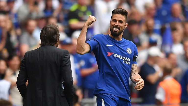 Olivier Giroud celebrates with Antonio Conte after scoring for Chelsea in the FA Cup semi-final against Southampton
