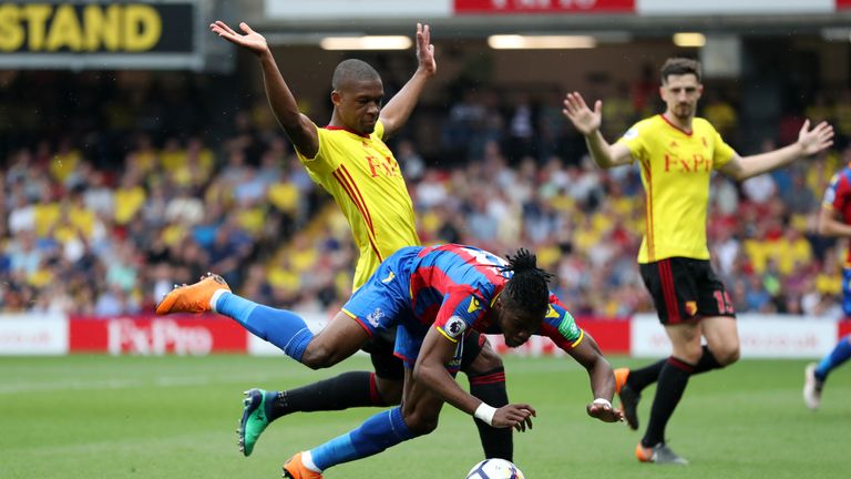 The first penalty shout saw Wilfried Zaha go down after tangling with Christian Kabasele