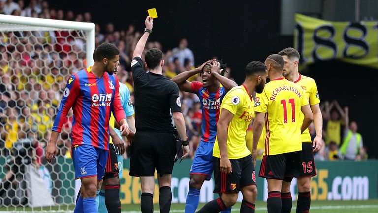 Wilfried Zaha was booked for simulation at Vicarage Road for the second season in a row