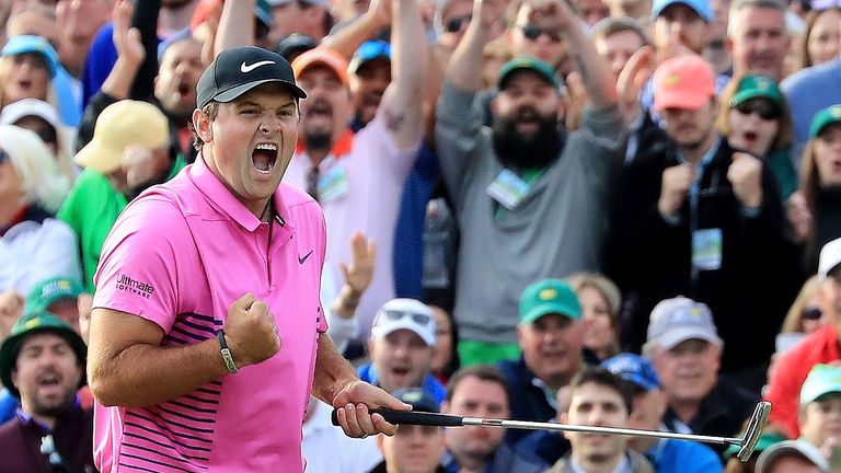 Patrick Reed of the United States celebrates after making par on the 18th green during the final round to win the 2018 Masters Tournament at Augusta National Golf Club