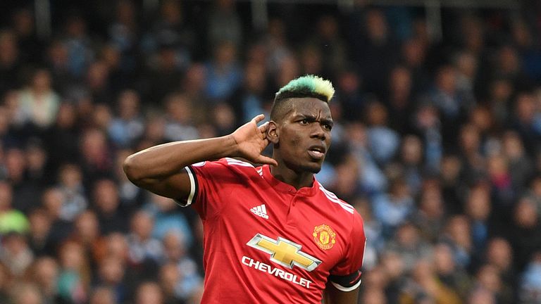 Paul Pogba celebrates scoring Manchester United's equaliser during the Premier League match between Manchester City and Manchester United at the Etihad Stadium