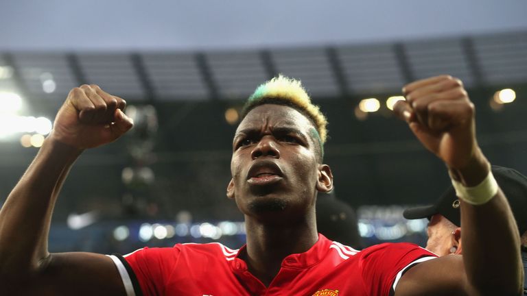 Paul Pogba celebrates after Manchester United beat Manchester City