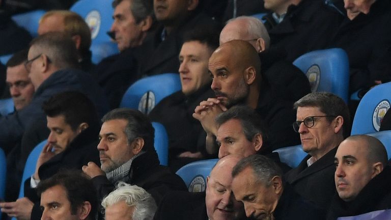 A glum Pep Guardiola looks on after being sent to the stands during City's Champions League second-leg defeat