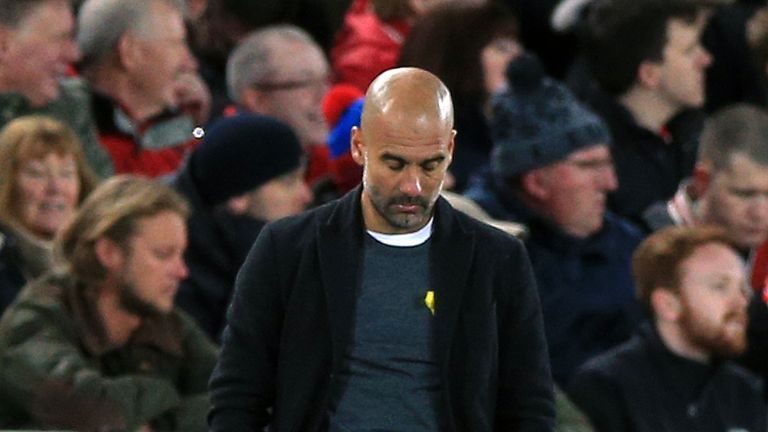 Manchester City manager Pep Guardiola appears dejected during the UEFA Champions League quarter-final, first leg match at Anfield, Liverpool