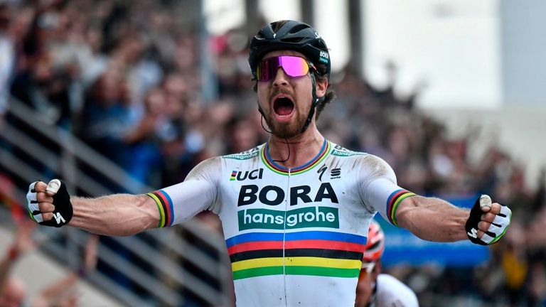 Slovakia's Peter Sagan celebrates winning the 116th edition of the Paris-Roubaix one-day classic cycling race, between Compiegne and Roubaix, on April 8, 2018 in Compiegne, northern France