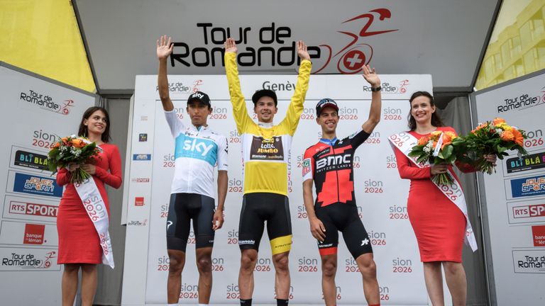 Primoz Roglic (C) after winning the Tour of Romandie ahead of Egan Bernal (L) and Richie Porte (R)