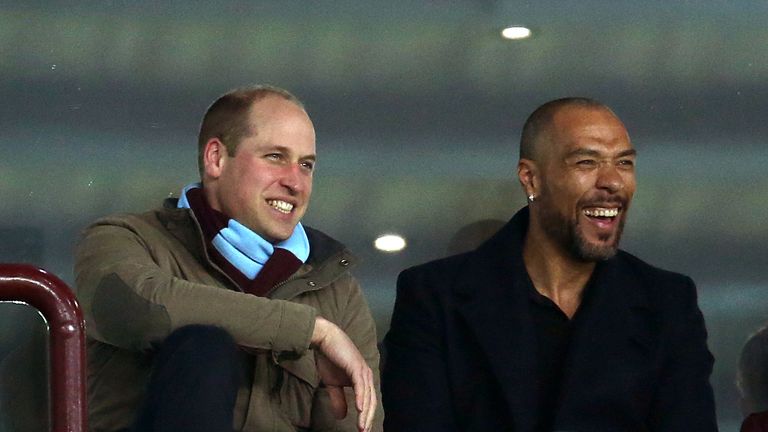 Prince William with John Carew during Aston Villa's match against Cardiff