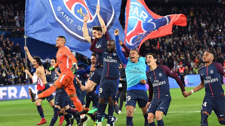 PSG players celebrate with their fans