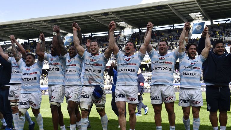 Racing 92 celebrate after their outstanding victory at Clermont