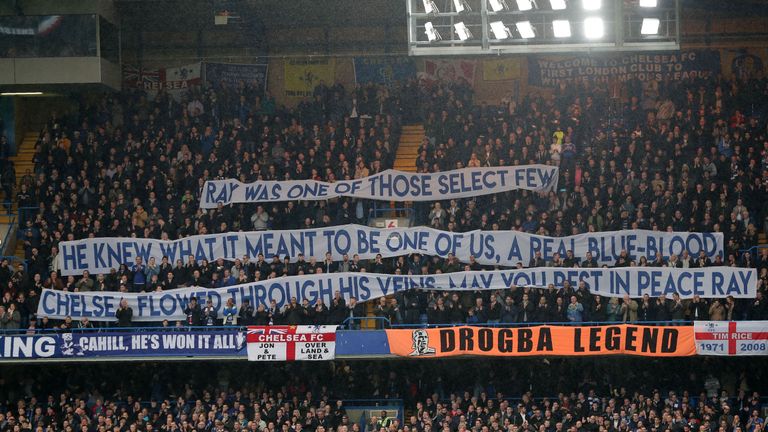 Supporters unveil a banner in memory of former Chelsea legend Ray Wilkins